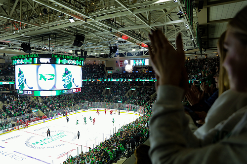 Fans celebrate a University of North Dakota hockey goal at Ralph Engelstad Arena in Grand Forks, where college-town energy, downtown dining and a lively arts scene create a memorable city getaway. Credit: North Dakota Tourism Fans celebrate a University of North Dakota hockey goal at Ralph Engelstad Arena in Grand Forks, where college-town energy, downtown dining and a lively arts scene create a memorable city getaway. Credit: North Dakota Tourism