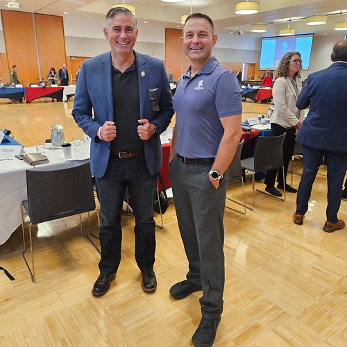 U.S. Representative Michael Baumgartner (left) and Warrior Advocate Leader Lani Kelp (right).
